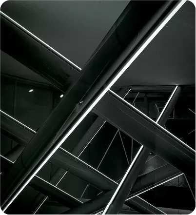 Crisscross linear LED ceiling lights in modern architectural interior